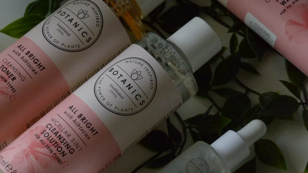 Botanics All Bright cleansing lotion bottles arranged on a surface.