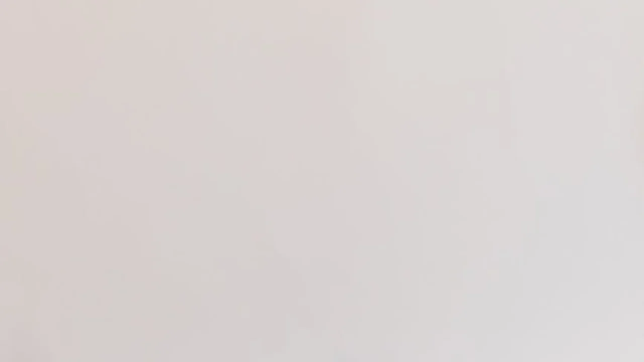 Soft neutral background with a subtle circular shadow, suitable as a placeholder image