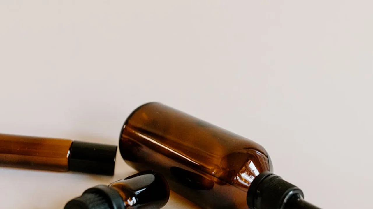 Amber glass dropper bottle of castor oil