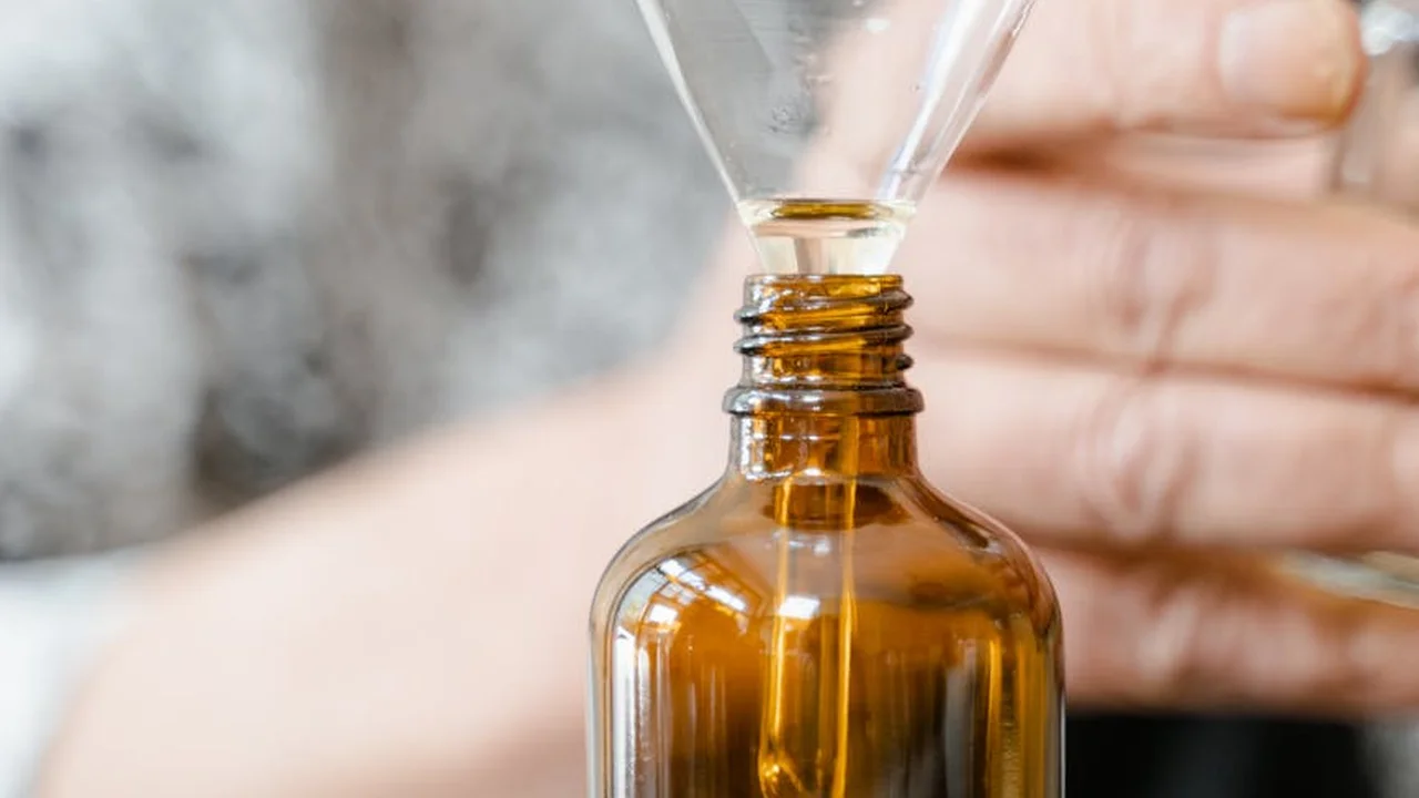 Amber glass essential oil bottle with a dropper