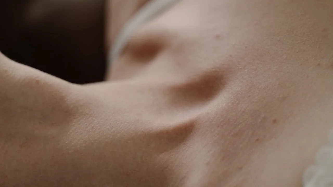 Close-up of skin on the shoulder/neck area showing natural texture