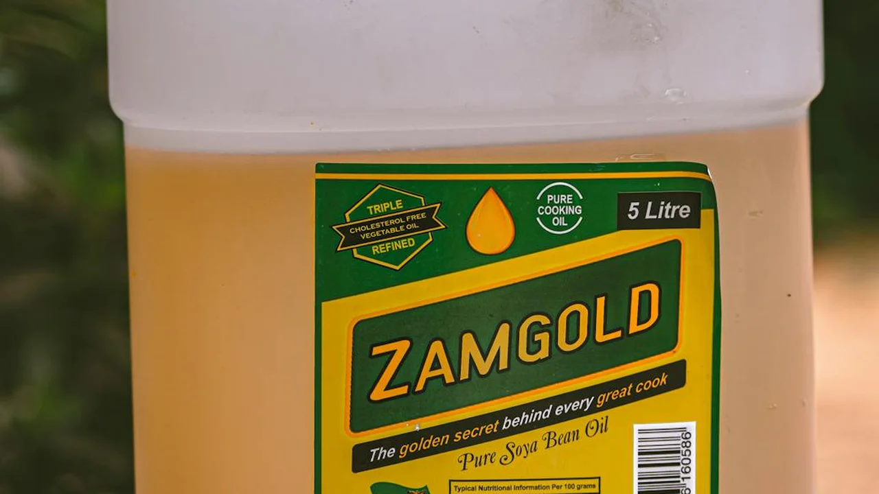 White plastic bottle of ZamGold Pure Soya Bean Oil with a green and yellow label, 5 Litre